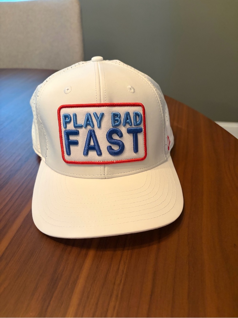 PLAY BAD FAST SNAPBACK HAT